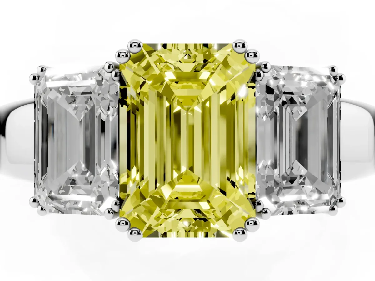 Fancy Yellow Three-Stone Emerald Cut Cut Diamond Ring with Channel Set Band and Four-Prong Setting White gold