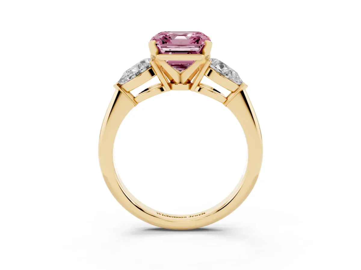 Fancy Pink Three-Stone Asscher Cut Diamond Ring with Pear Side Stones and Four-Prong Setting Yellow gold