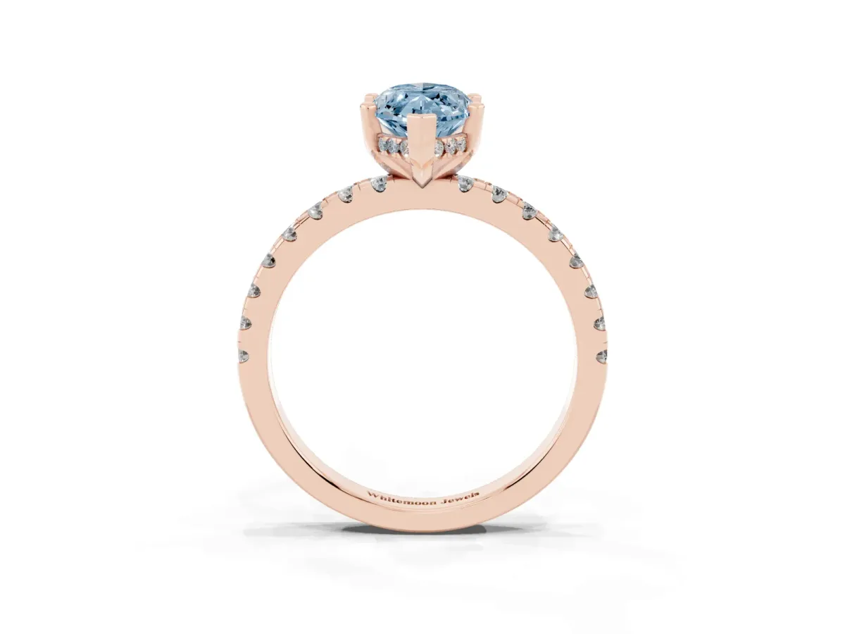 Fancy Blue Marquise Cut Diamond Solitaire Ring with Round Pavé Band and Four-Prong Setting Rose gold