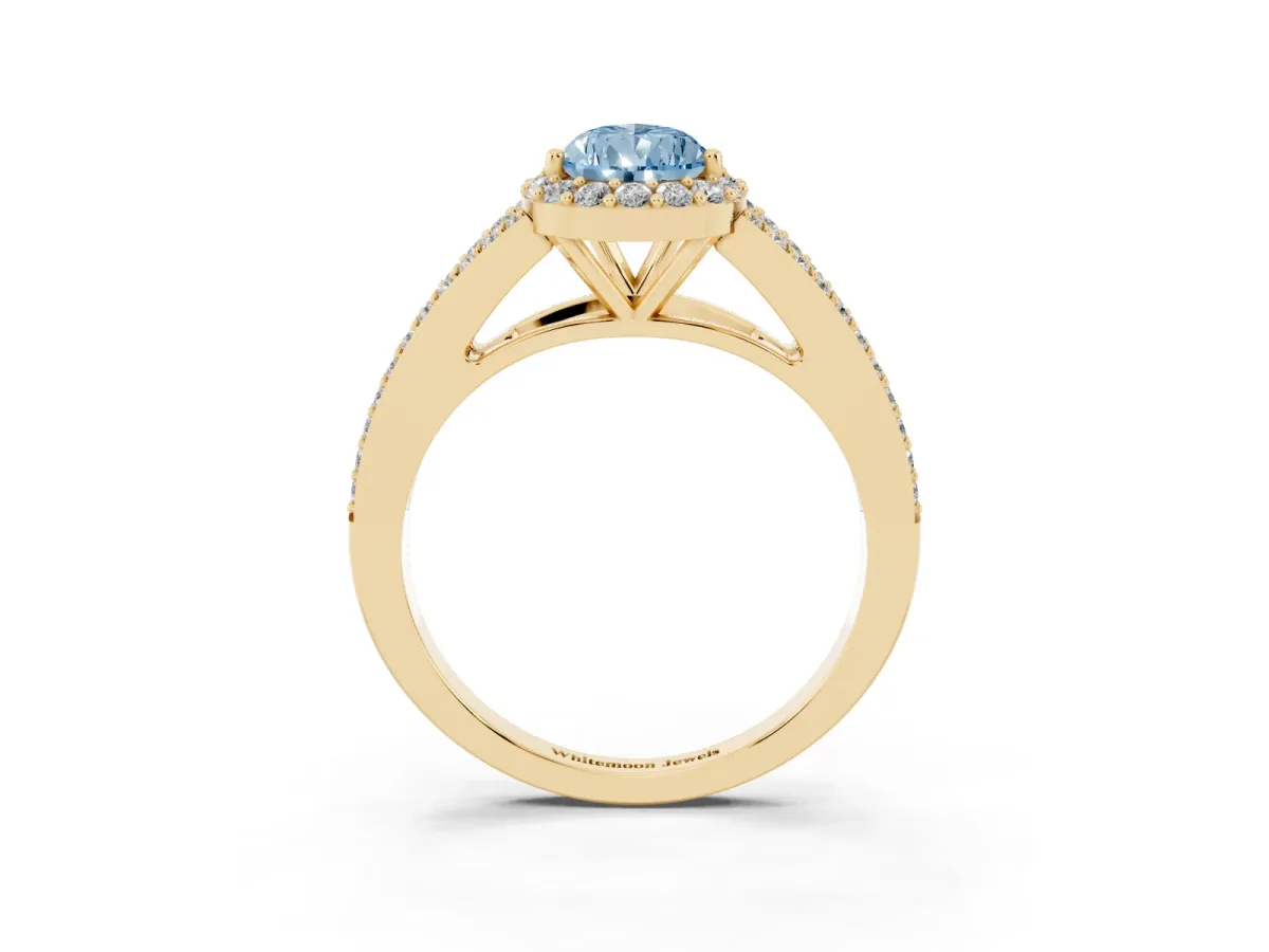 Fancy Blue Pear Cut Halo Split Shank Pave Diamond Ring with Four-Prong Setting Yellow gold