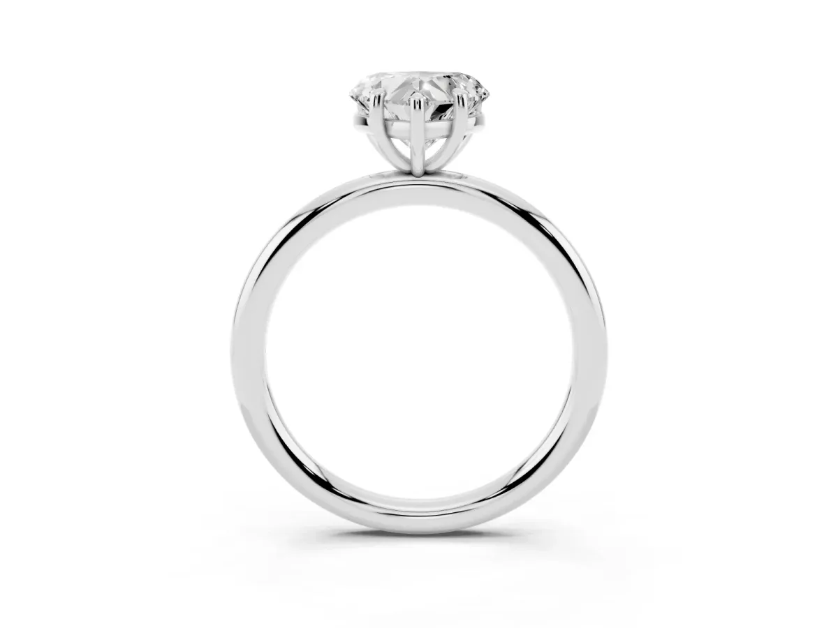 Heart Cut Solitaire Diamond Ring with Four-Prong Setting on a Plain Band Platinum