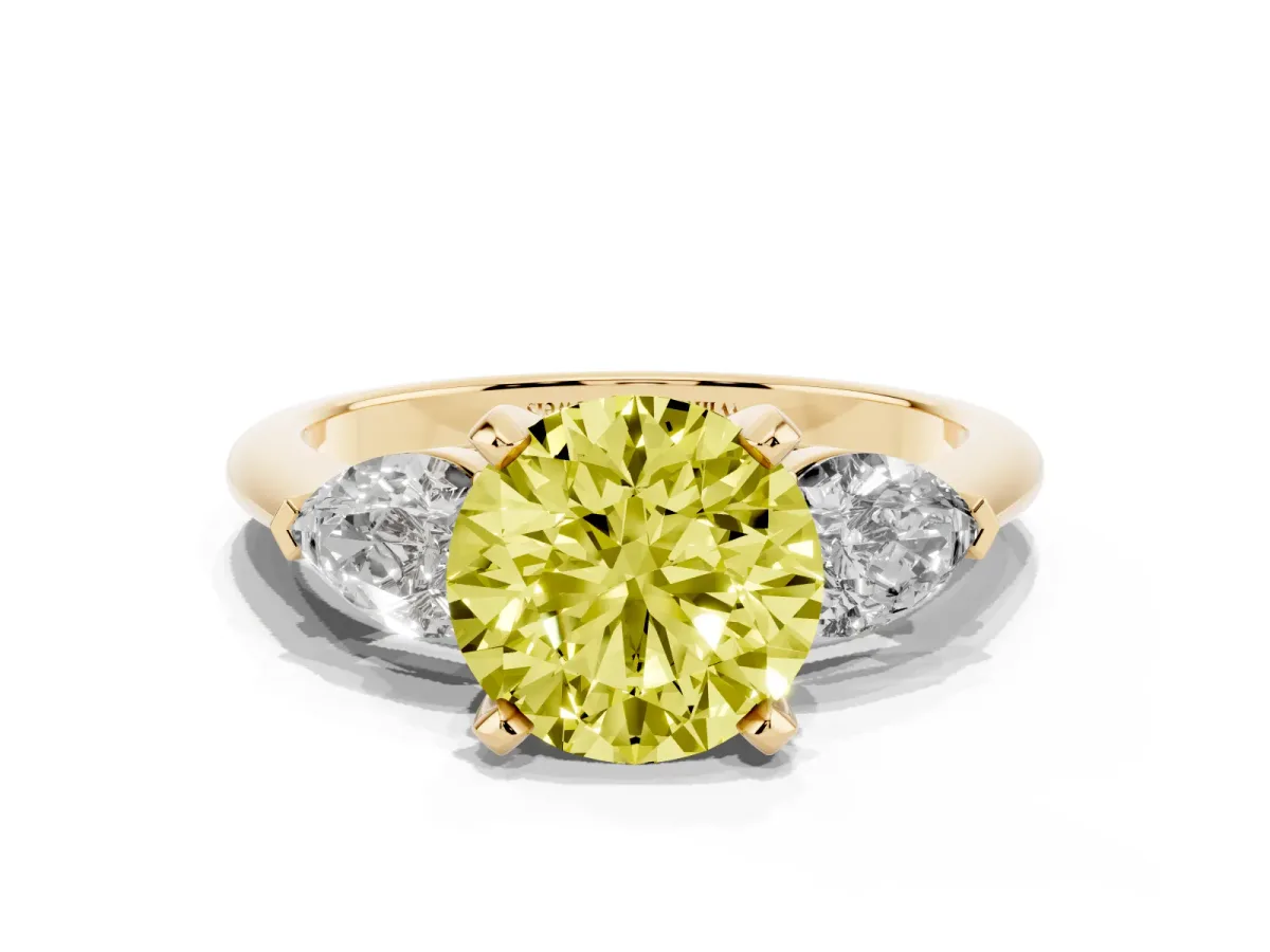Fancy Yellow Three-Stone Round Cut Diamond Ring with Pear Side Stones and Four-Prong Setting Yellow gold