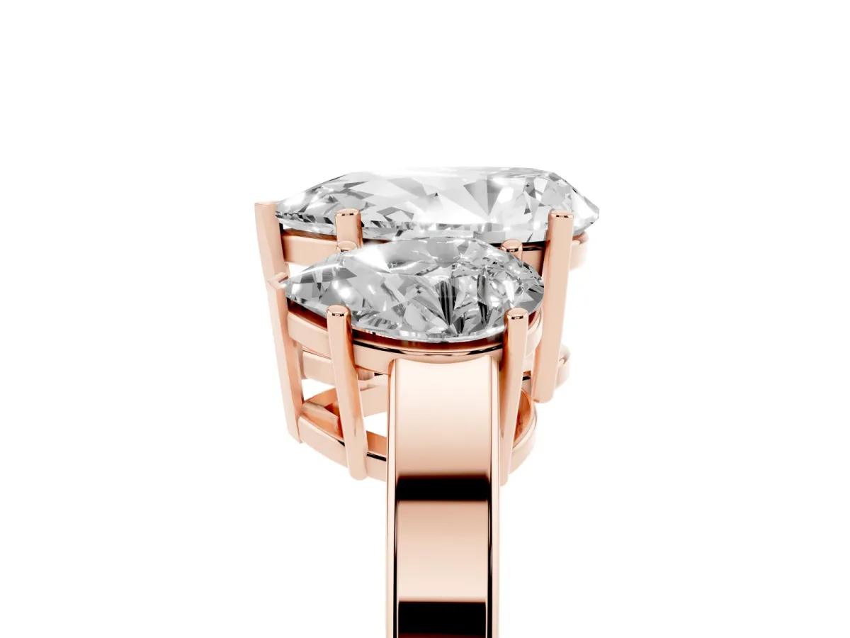 Three-Stone Pear Cut Cut Diamond Engagement Ring with Flat Band and Four-Prong Setting Rose gold