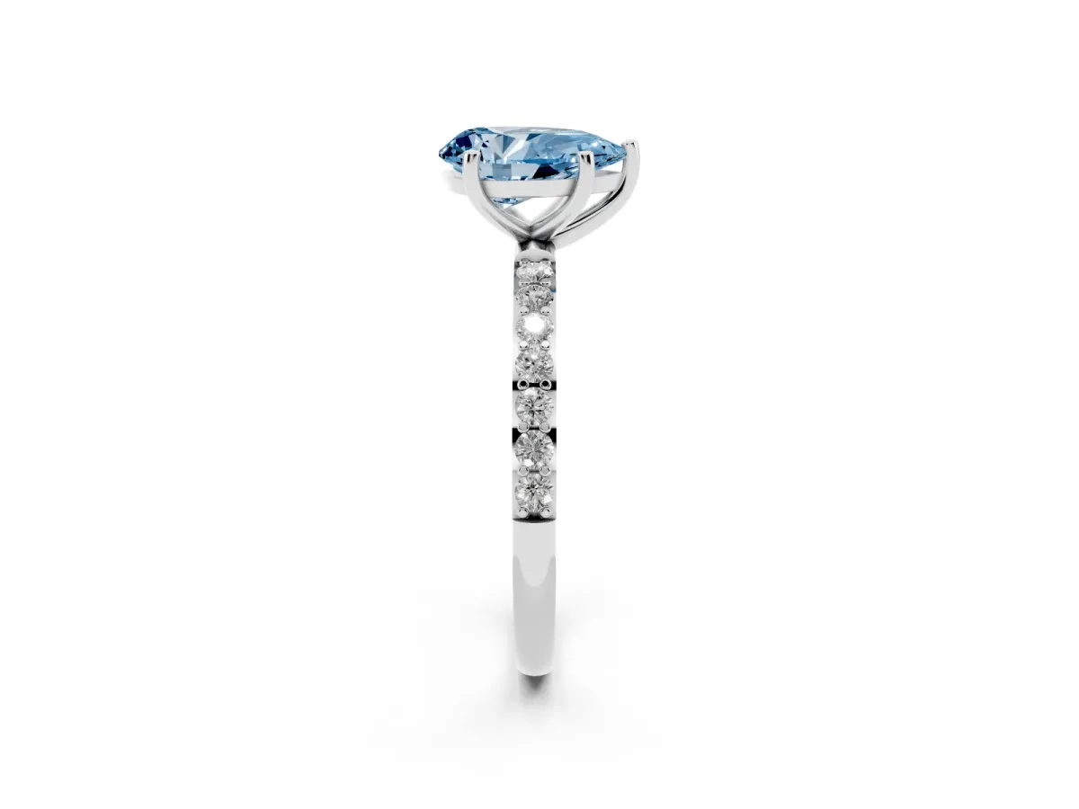 Fancy Blue Pear Cut Diamond Solitaire Ring with Round Pavé Shoulders and Prong Setting Silver