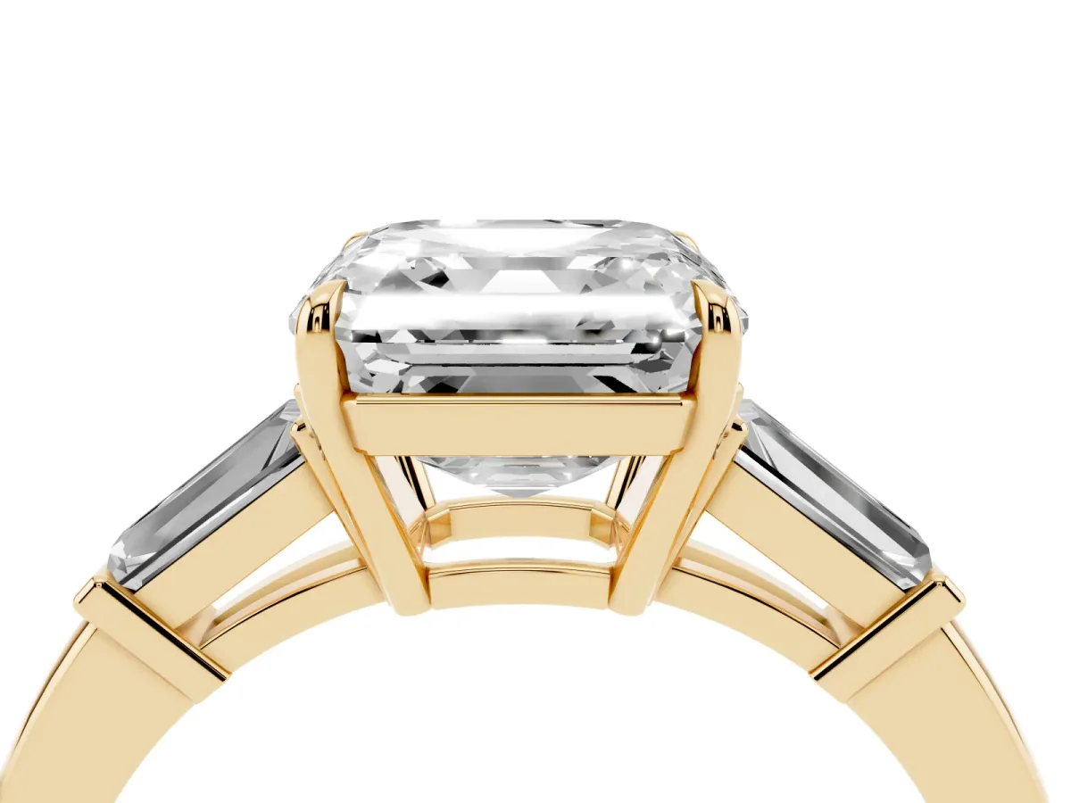 Asscher Cut Diamond Three-Stone Ring with Tapered Baguette Side Stones and Prong Setting Yellow gold