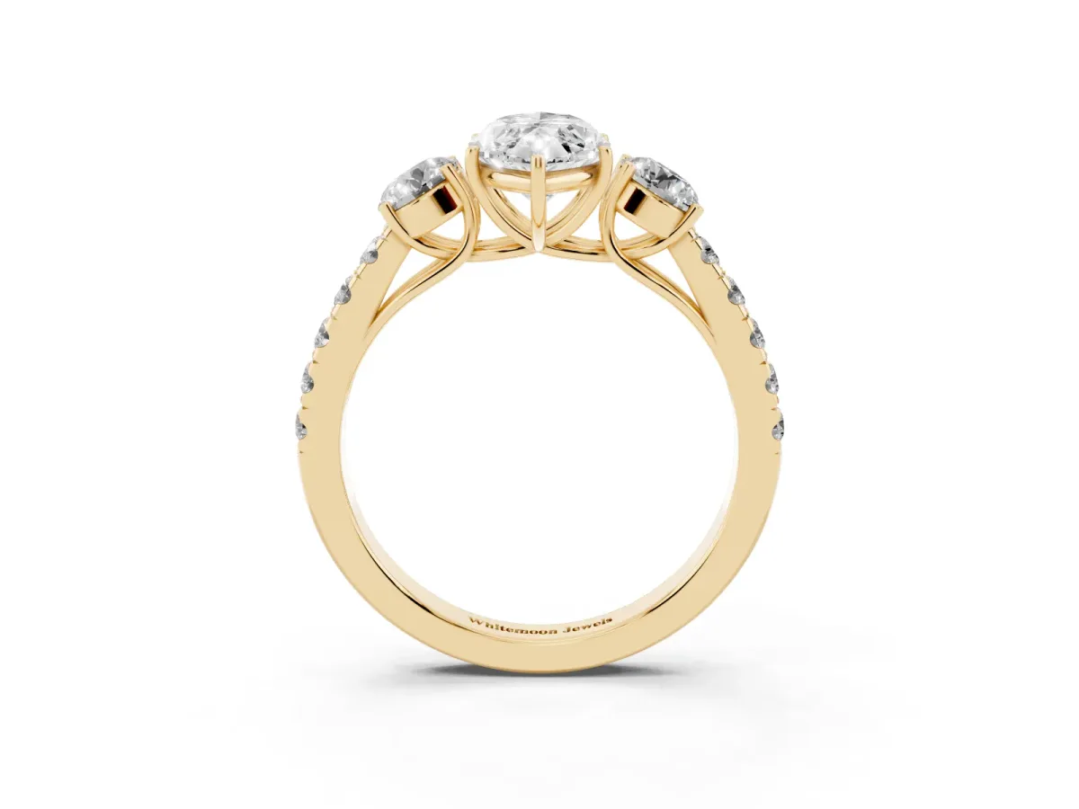 Marquise Cut Cut Diamond Three-Stone Ring with Round Side Stones and Pavé Band Yellow gold
