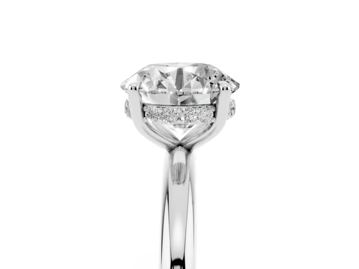 Round Cut Diamond Solitaire Ring with Thin Band and Four-Prong Setting Silver