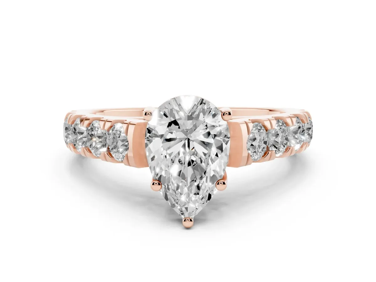 Pear Cut Cut Diamond Solitaire Ring with Micro Pave Band and Prong Setting Rose gold