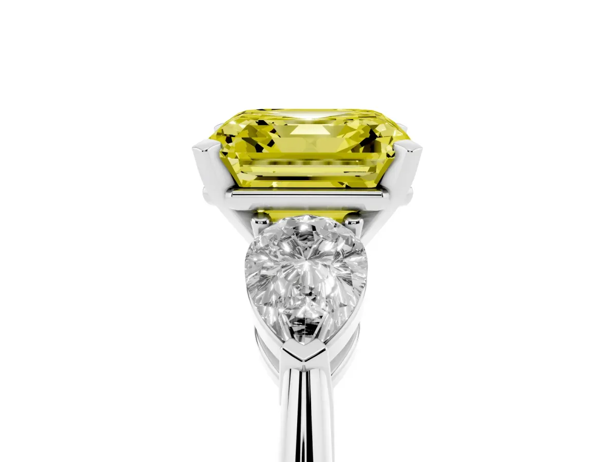Fancy Yellow Three-Stone Asscher Cut Diamond Ring with Pear Side Stones and Four-Prong Setting Silver