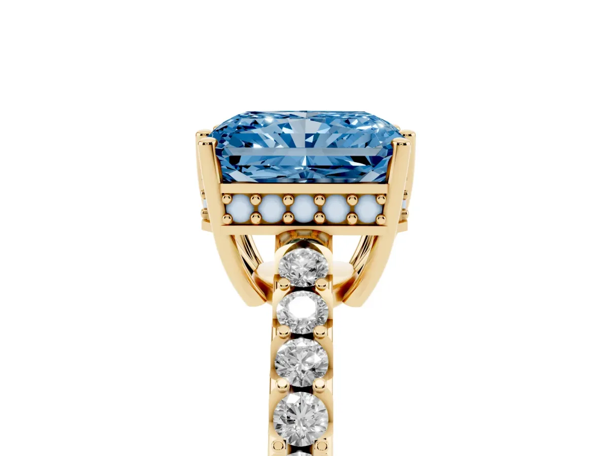 Fancy Blue Radiant Cut Solitaire Diamond Engagement Ring with Pavé Band and Six-Prong Setting Yellow gold