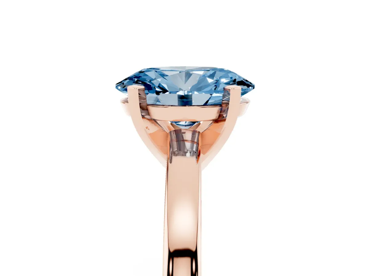 Fancy Blue Oval Cut Solitaire Diamond Engagement Ring with Four-Prong Setting on a Classic Band Rose gold