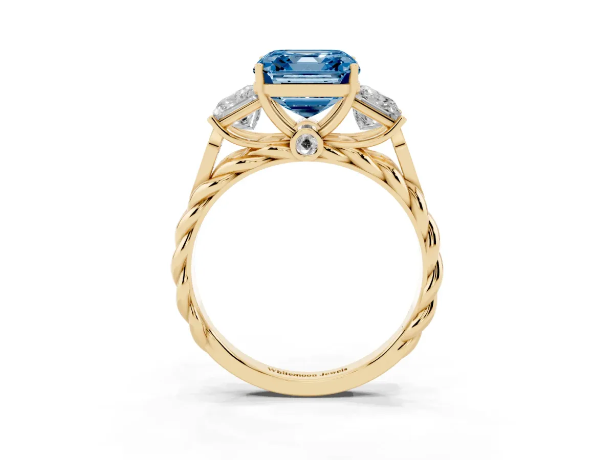 Fancy Blue Three-Stone Asscher Cut Diamond Braided Band Ring with Four-Prong Setting Yellow gold