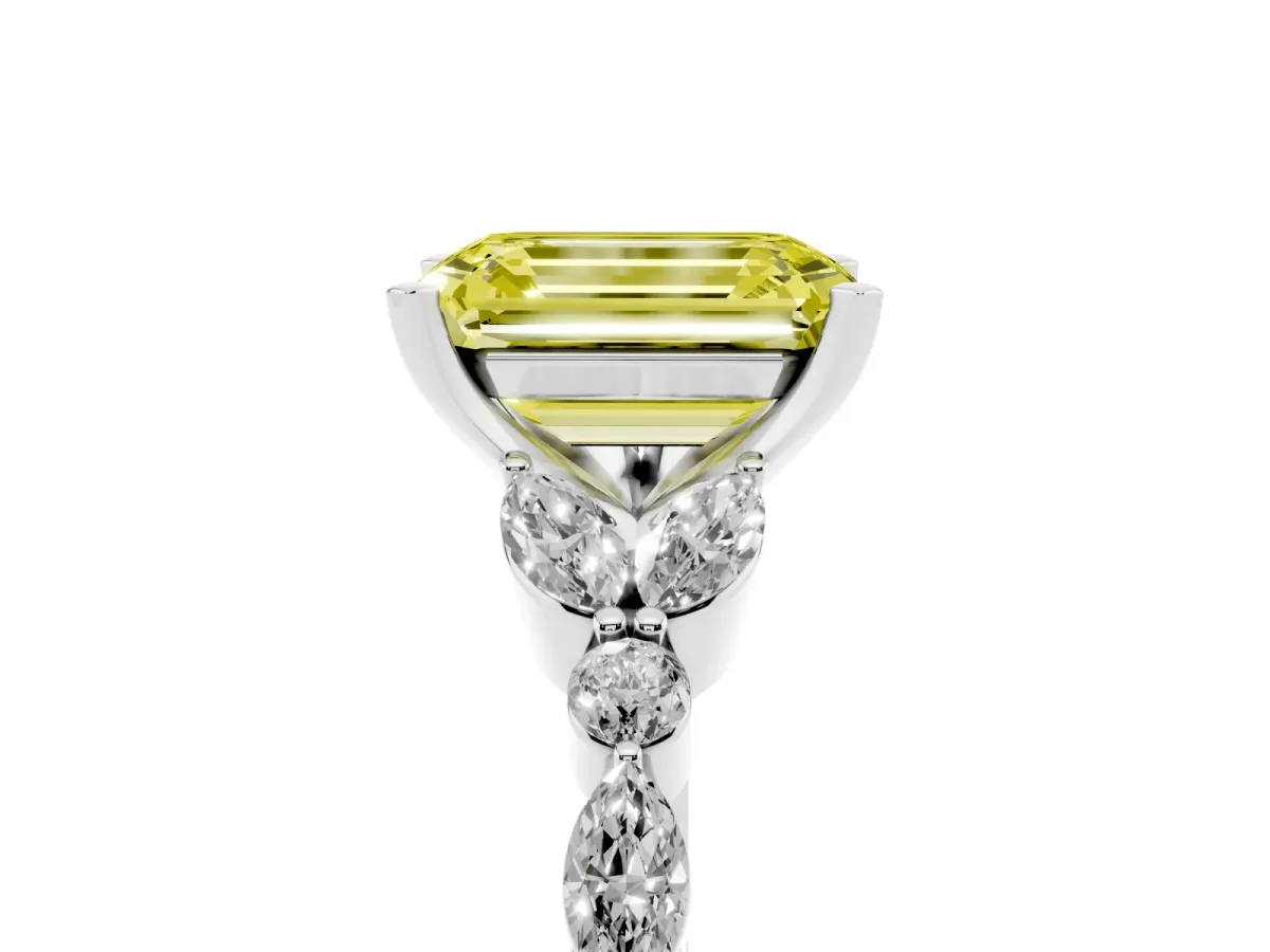 Fancy Yellow Emerald Cut Diamond Solitaire Ring with Side Stones and Four-Prong Setting Platinum