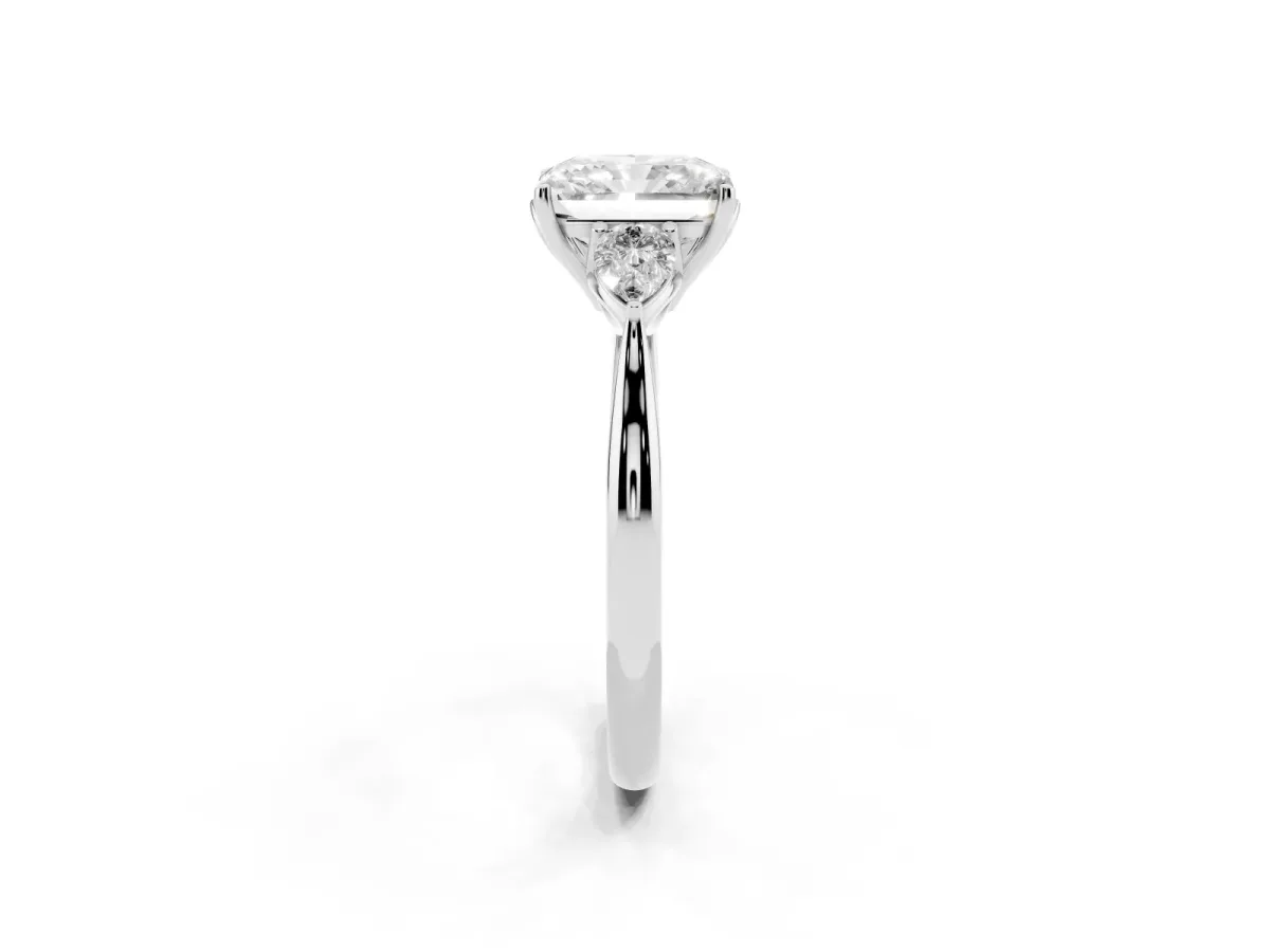 Three-Stone Radiant Cut Brilliant Diamond Solitaire Ring with Tapered Band and Four-Prong Setting Platinum