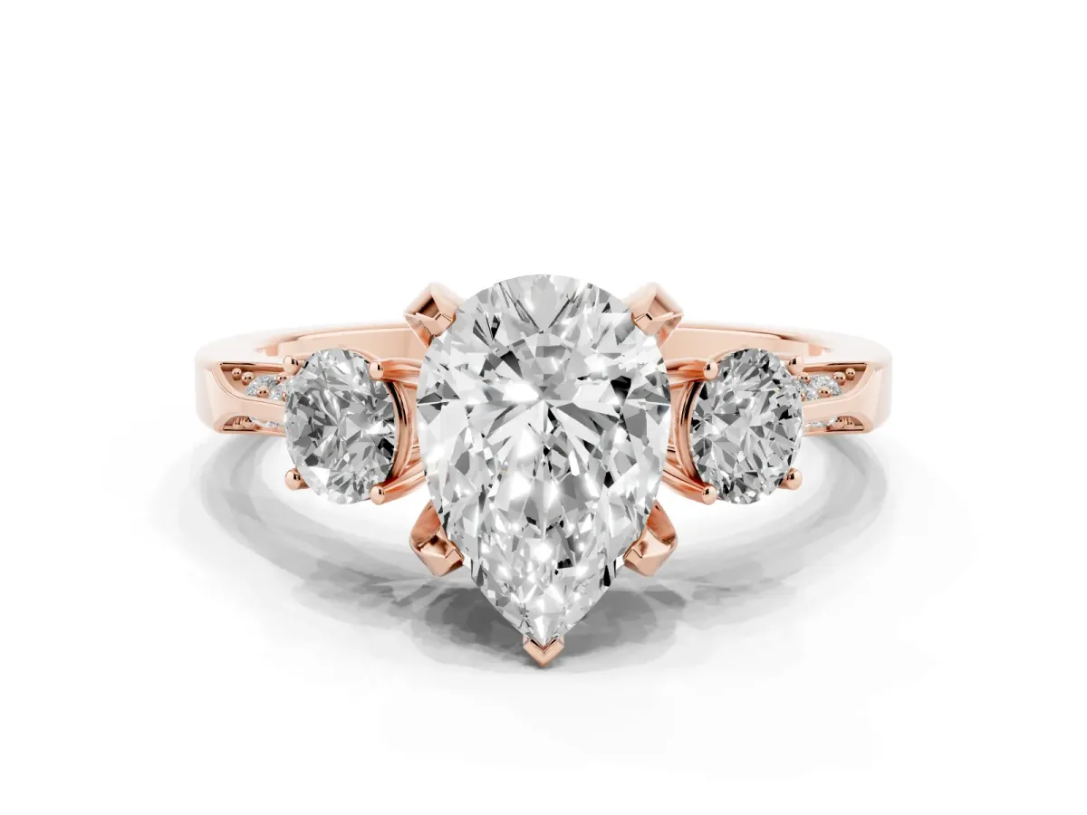 Pear Cut Brilliant Three-Stone Diamond Ring with Pavé Band and Four-Prong Setting Rose gold