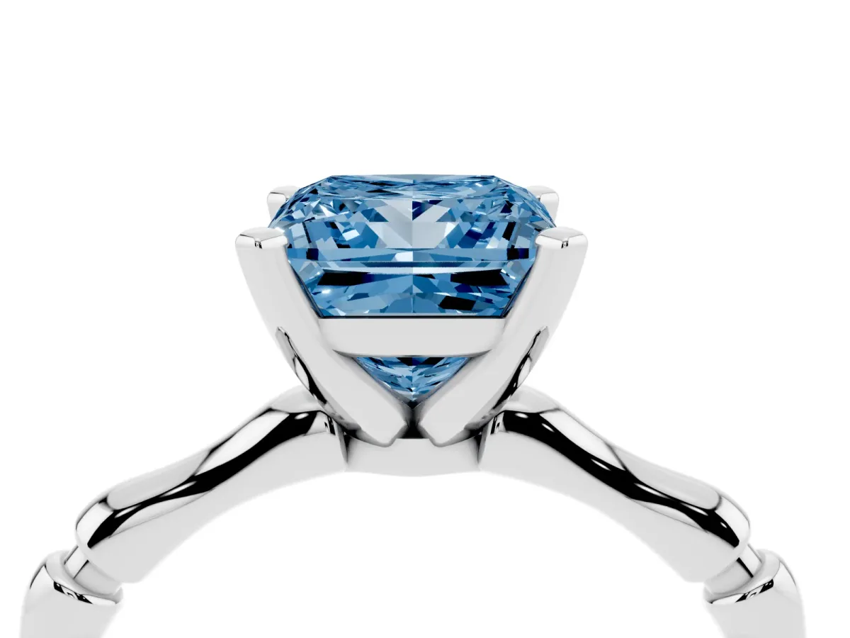 Fancy Blue Princess Cut Solitaire Diamond Ring with Bamboo Band and Four-Prong Setting Silver