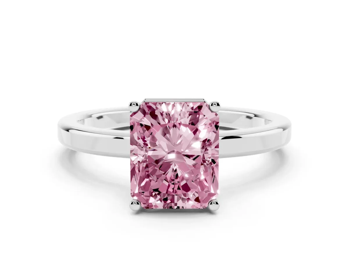 Fancy Pink Radiant Cut Cut Solitaire Engagement Ring with Four-Prong Setting on a Classic Band Silver