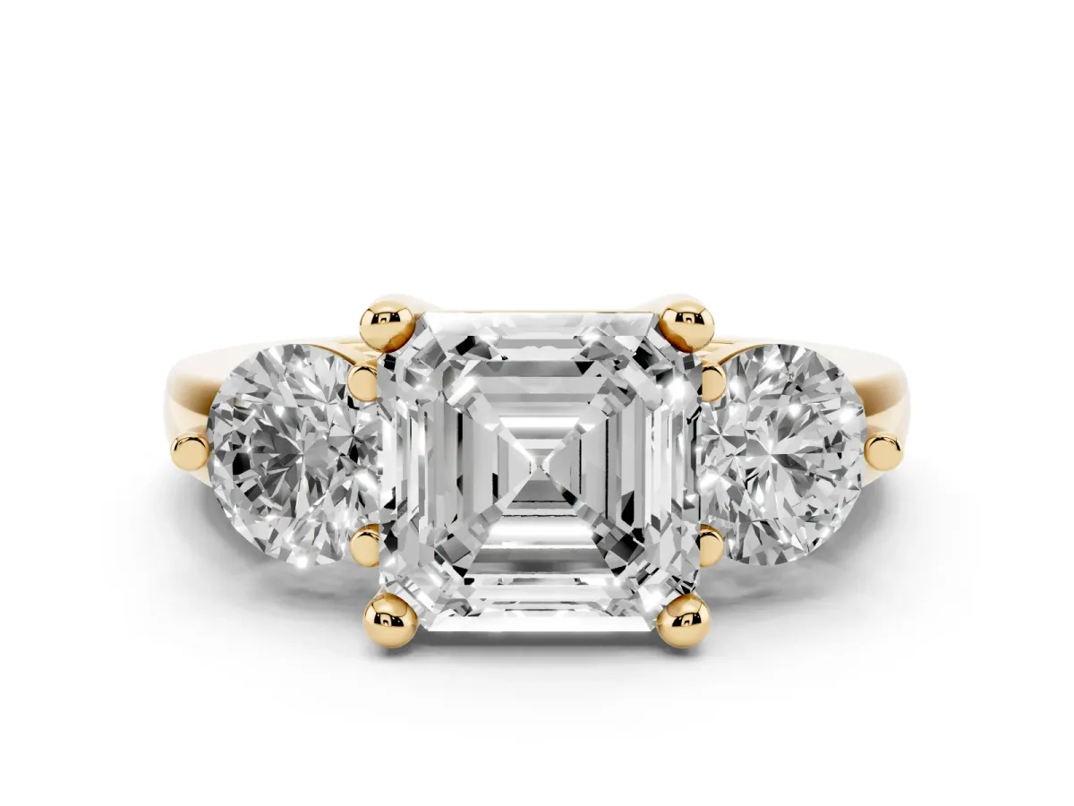 Three-Stone Asscher Cut Brilliant Cut Solitaire Ring with Prong Setting on a Classic Band Yellow gold