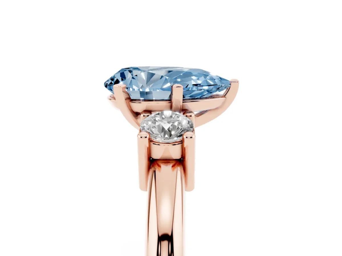 Fancy Blue Three-Stone Pear Cut Cut Diamond Solitaire with Prong Setting and Classic Band Rose gold