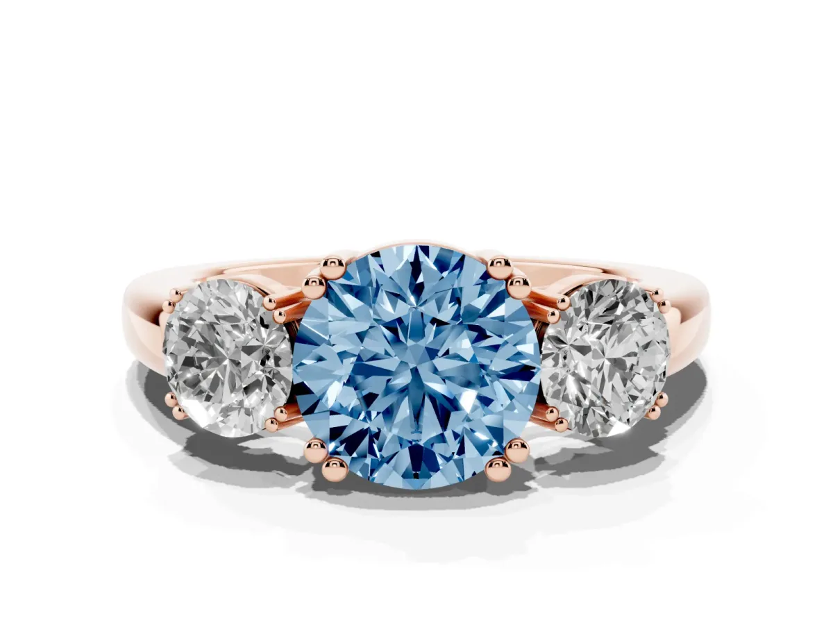 Fancy Blue Three-Stone Round Cut Cut Diamond Ring with Channel Set Band and Four-Prong Setting Rose gold