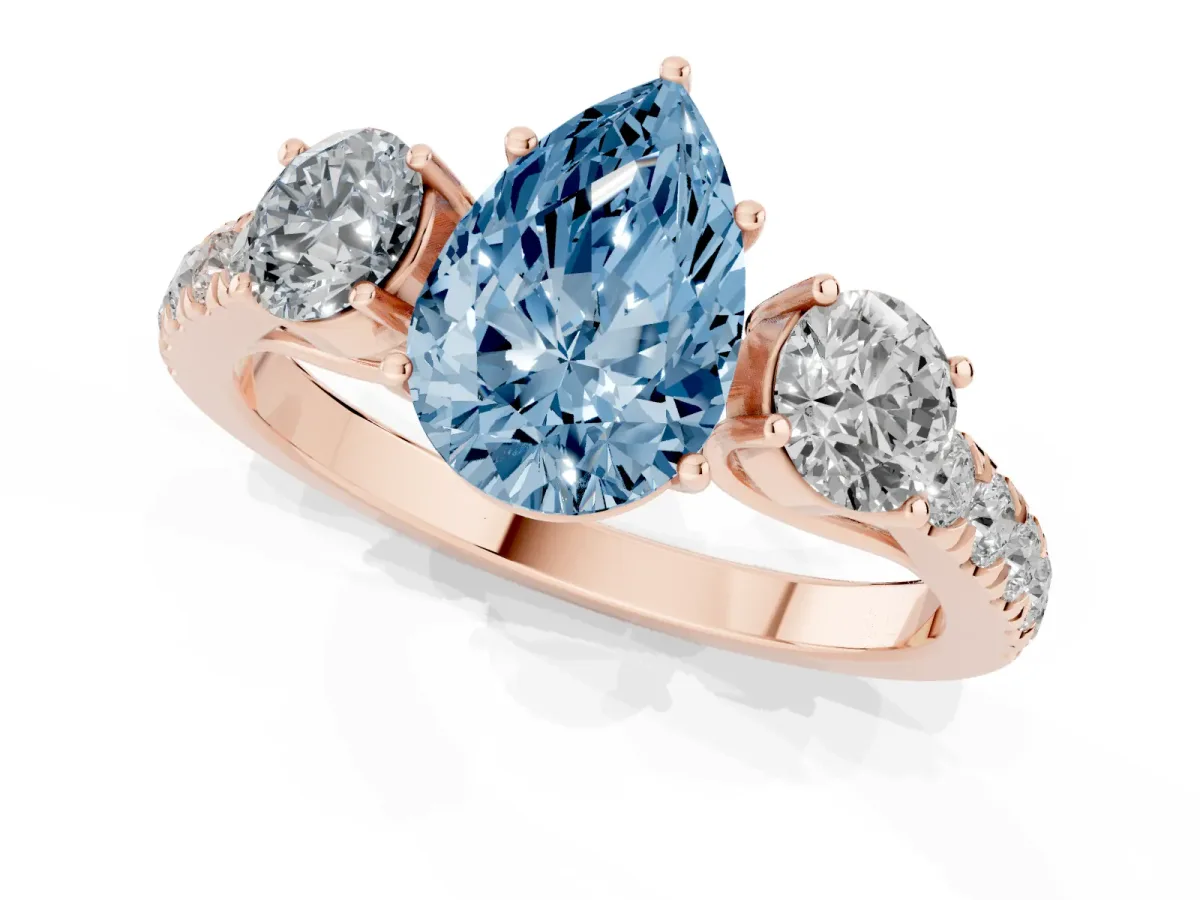 Fancy Blue Pear Cut Cut Diamond Three-Stone Ring with Round Side Stones and Pavé Band Rose gold