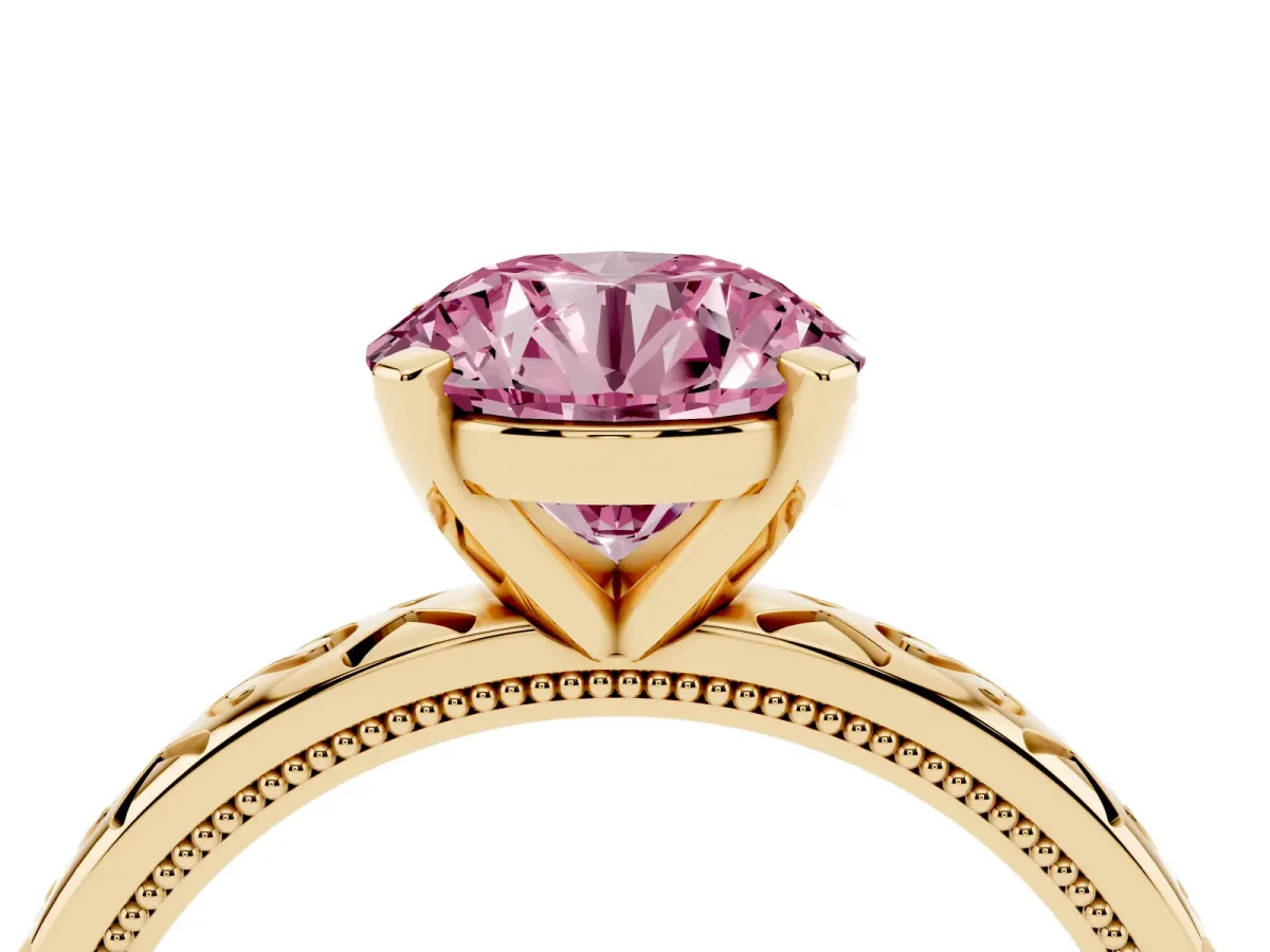 Fancy Pink Round Cut Solitaire Engagement Ring with Scrollwork Band and Four-Prong Setting Yellow gold