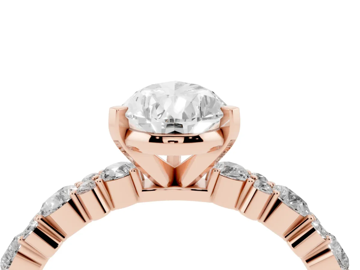 Pear Cut Diamond Side Stone Solitaire Ring with Round and Four-Prong Setting Rose gold