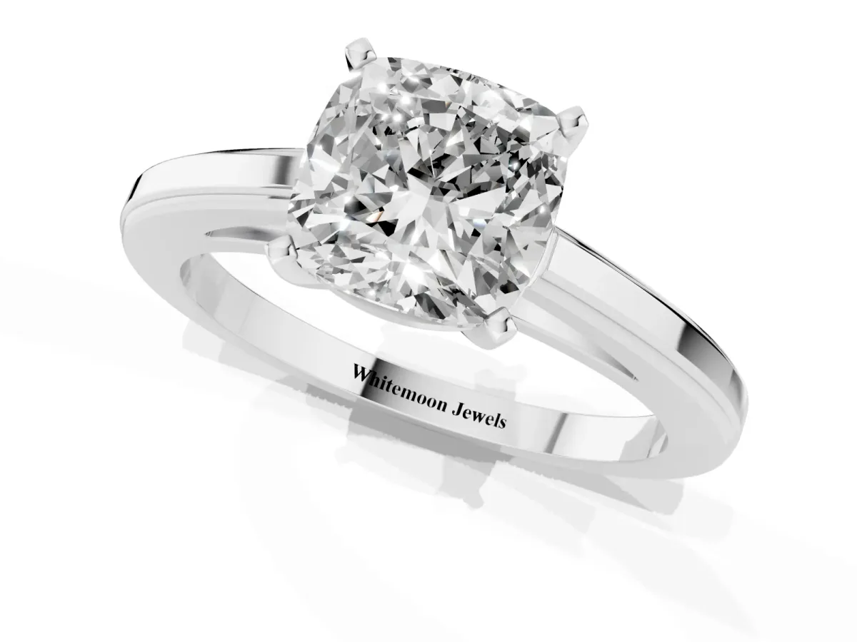 Cushion Cut Solitaire Diamond Ring with Four-Prong Setting and Classic Band Silver