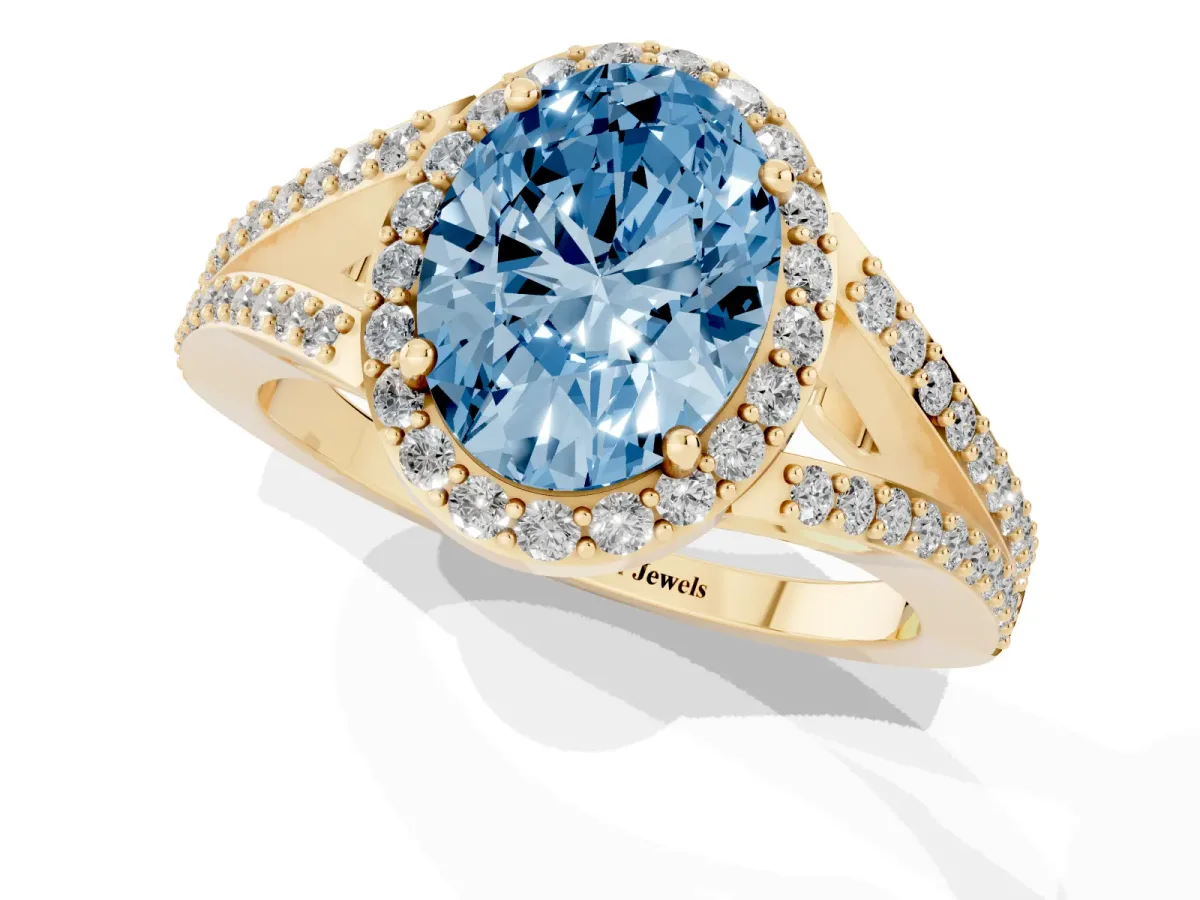 Fancy Blue Oval Cut Halo Split Shank Pave Diamond Ring with Four-Prong Setting Yellow gold
