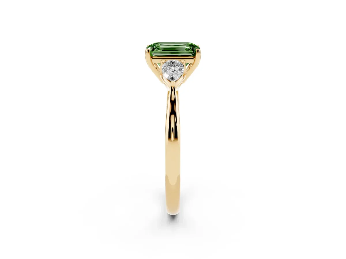 Fancy Green Three-Stone Emerald Cut Brilliant Diamond Solitaire Ring with Tapered Band and Four-Prong Setting Yellow gold