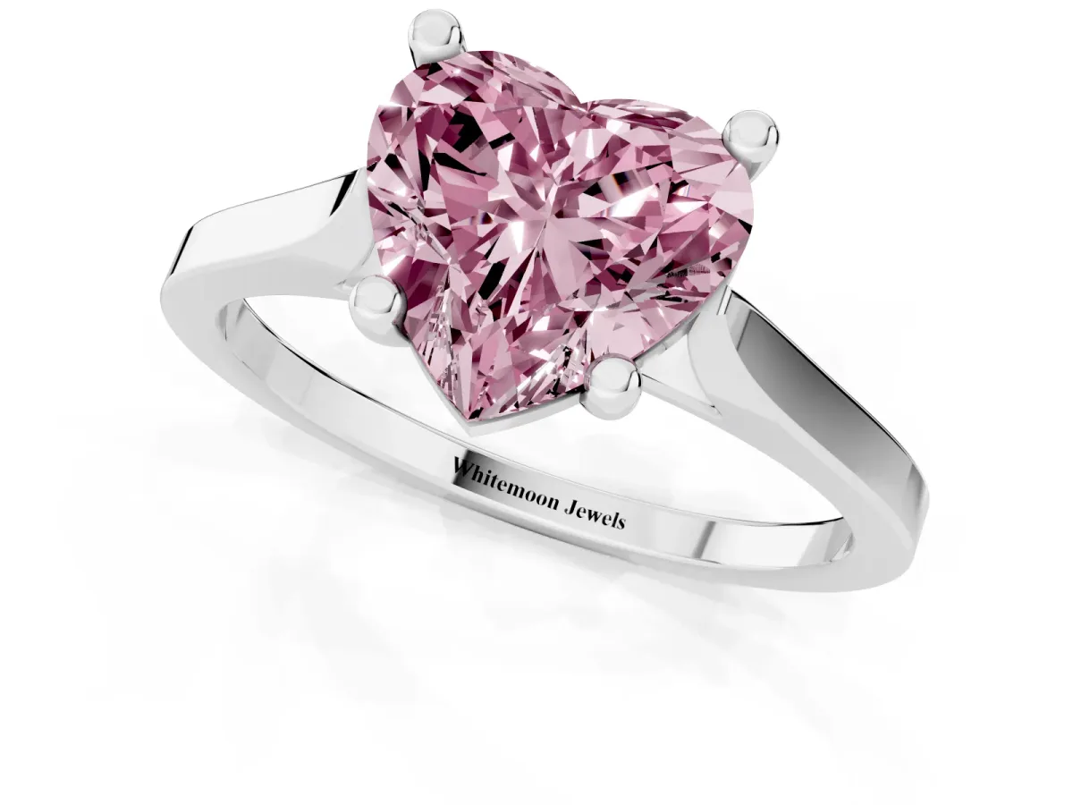 Fancy Pink Heart Cut Solitaire Diamond Ring with Four-Prong Setting and Tapered Band Silver