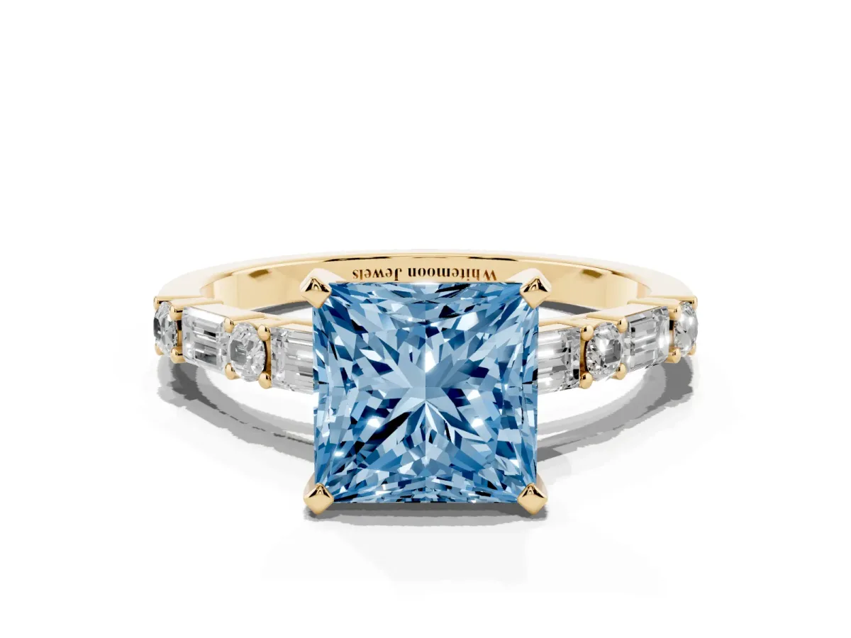 Fancy Blue Princess Cut Diamond Solitaire with Side Baguettes and Channel Set Band Yellow gold