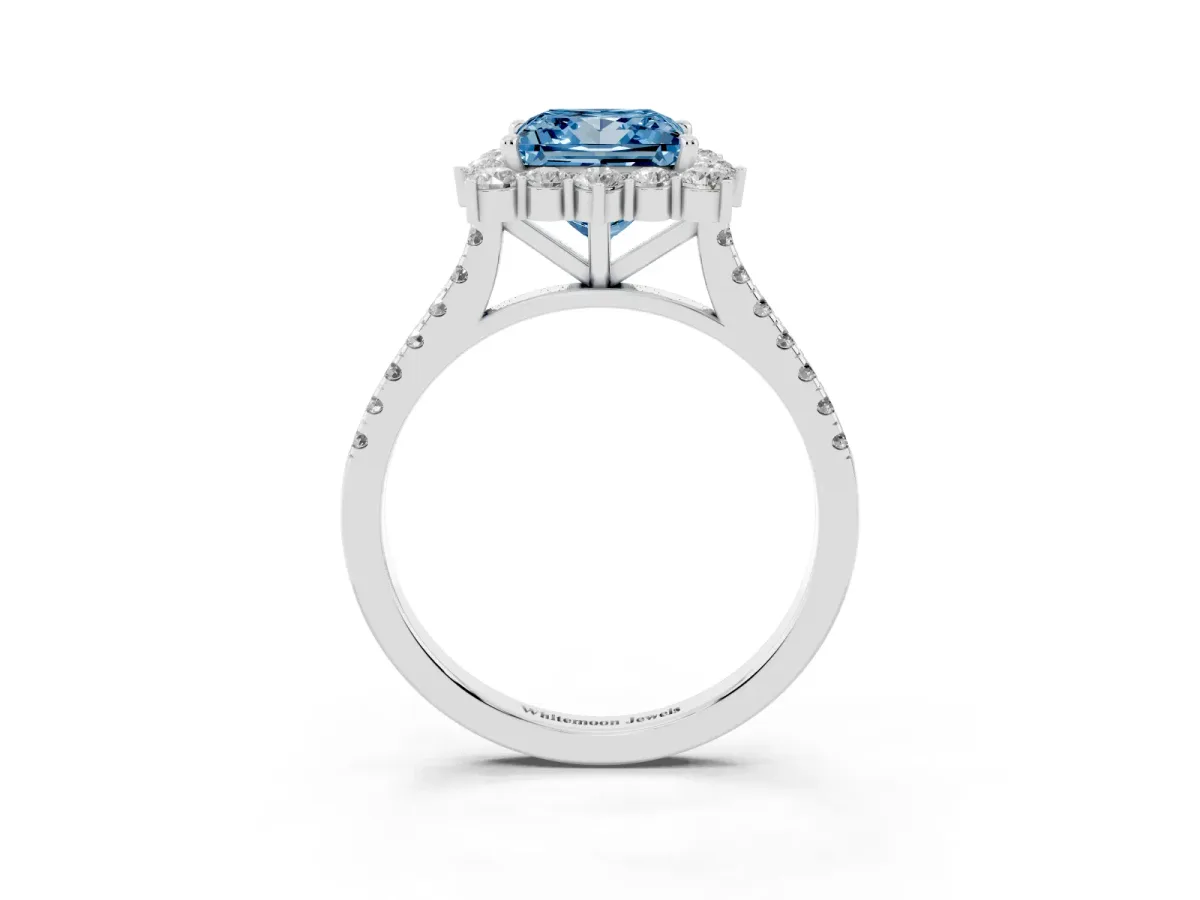 Fancy Blue Princess Cut Halo Diamond Ring with Pavé Band and Prong Setting Platinum