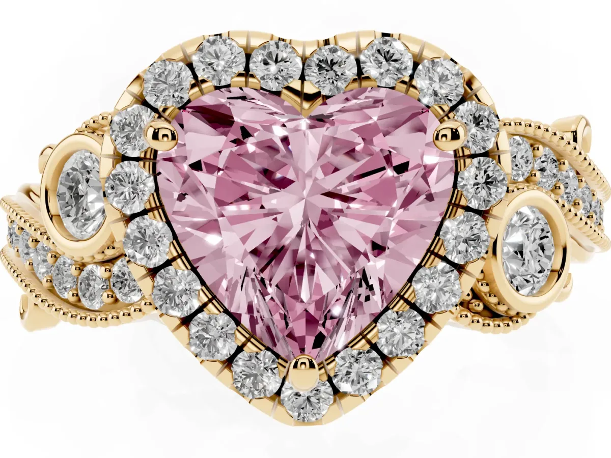 Fancy Pink Heart Cut Halo Diamond Ring with Milgrain and Bezel Accents on a Split Shank Band Yellow gold