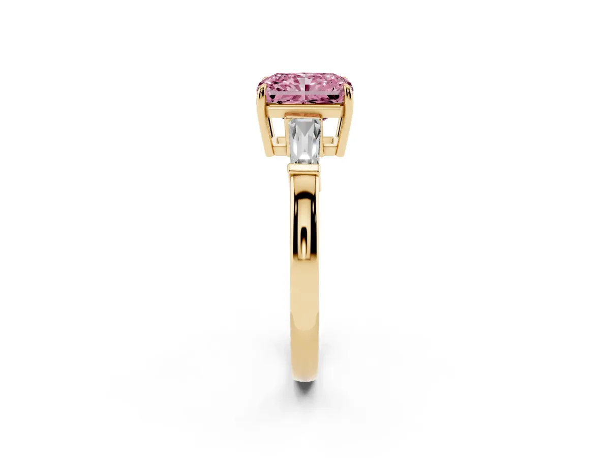 Fancy Pink Radiant Cut Diamond Three-Stone Ring with Tapered Baguette Side Stones and Prong Setting Yellow gold