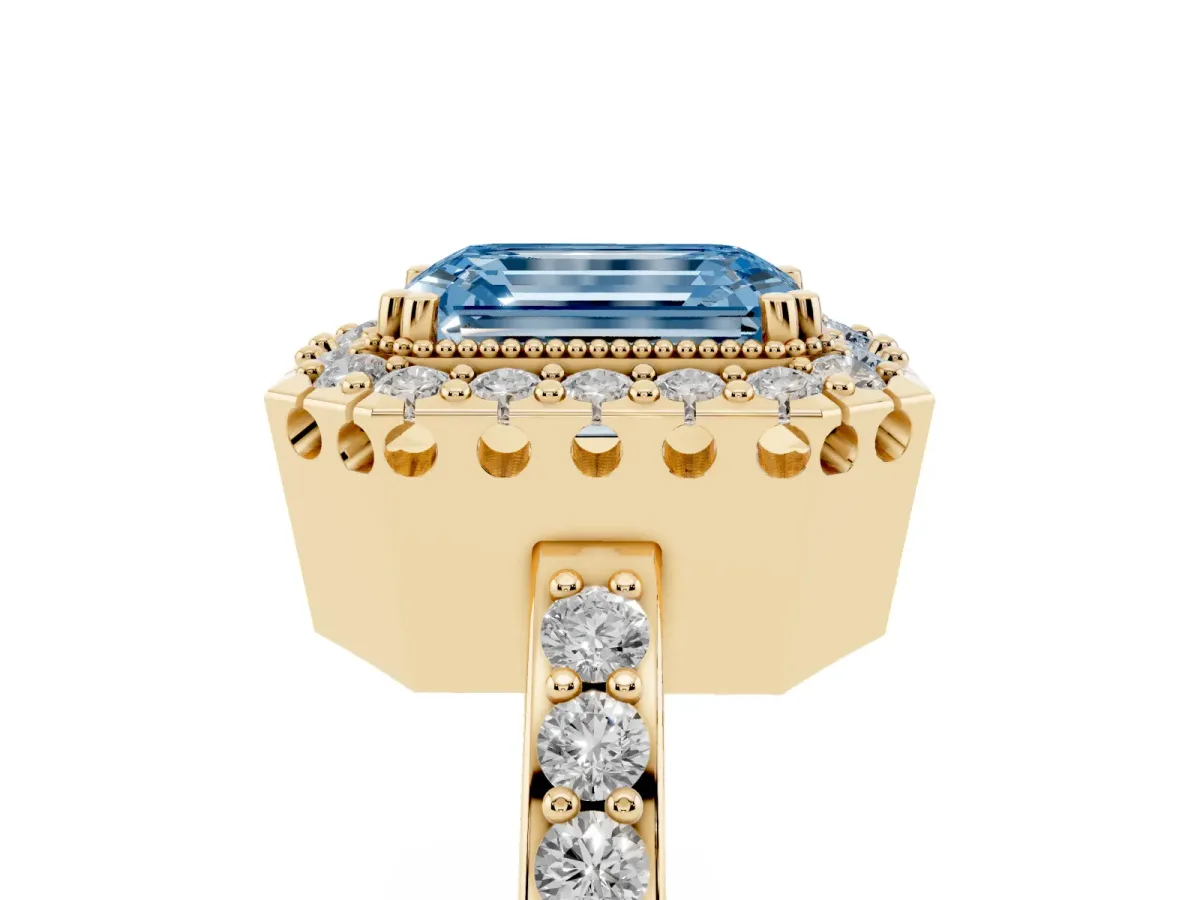 Fancy Blue Emerald Cut Diamond Halo Ring with Pavé Band and Prong Setting Yellow gold