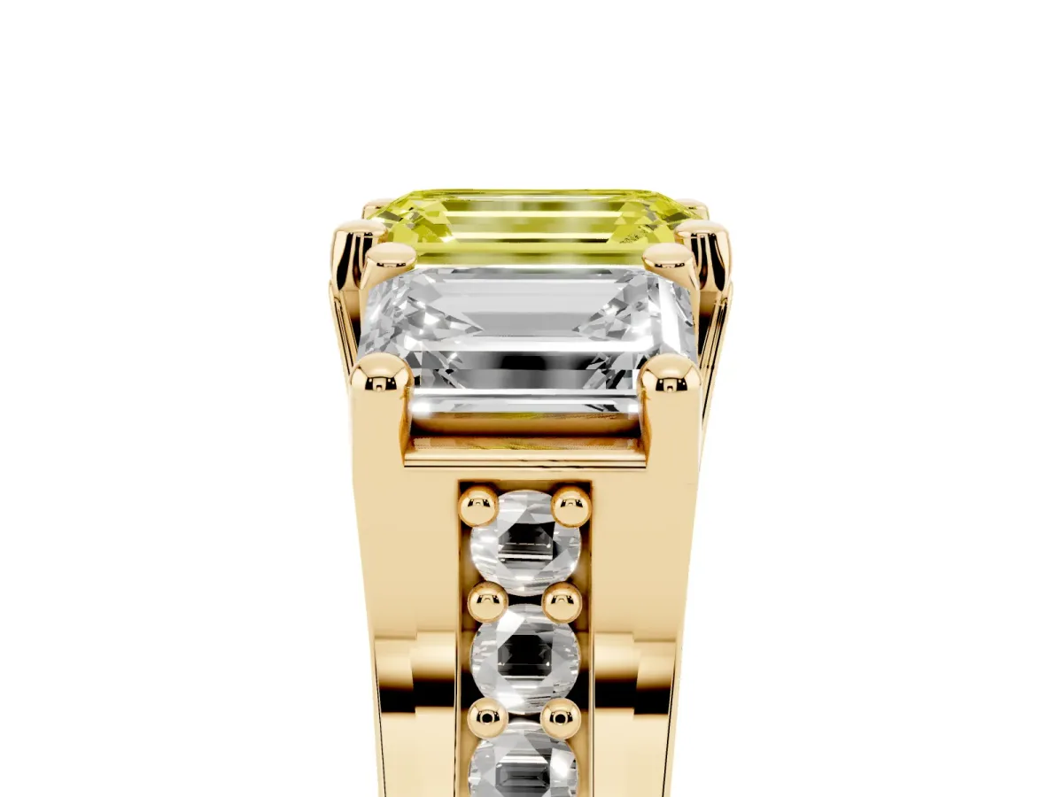 Fancy Yellow Emerald Cut Diamond Three-Stone Ring with Channel Set Band and Four-Prong Setting Yellow gold