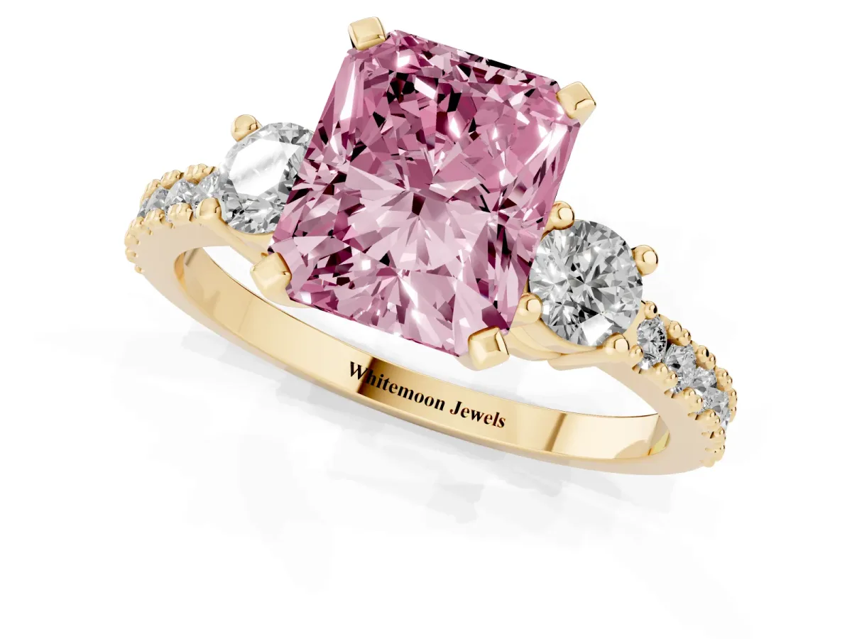 Fancy Pink Radiant Cut Three-Stone Diamond Pavé Band with Prong Setting Yellow gold