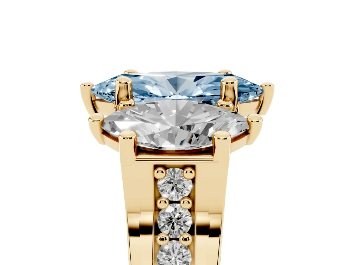 Fancy Blue Marquise Cut Diamond Three-Stone Ring with Channel Set Band and Four-Prong Setting Yellow gold