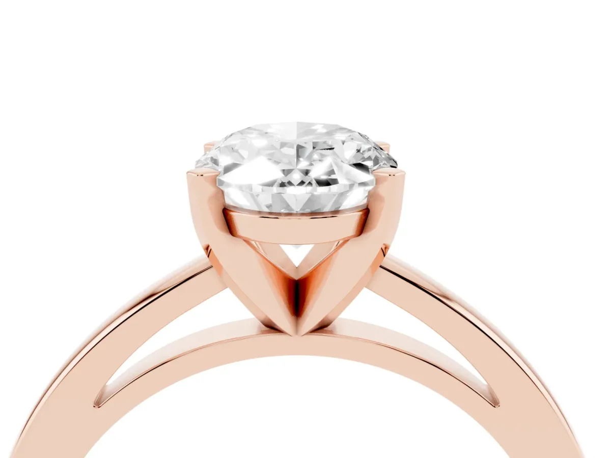 Oval Cut Solitaire Diamond Engagement Ring with Four-Prong Setting on a Classic Band Rose gold