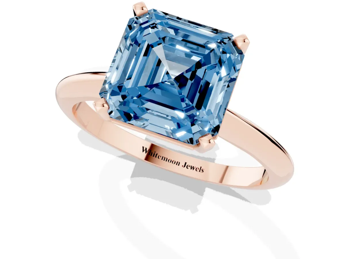Fancy Blue Asscher Cut Cut Solitaire Ring with Four-Prong Setting on a Classic Band Rose gold