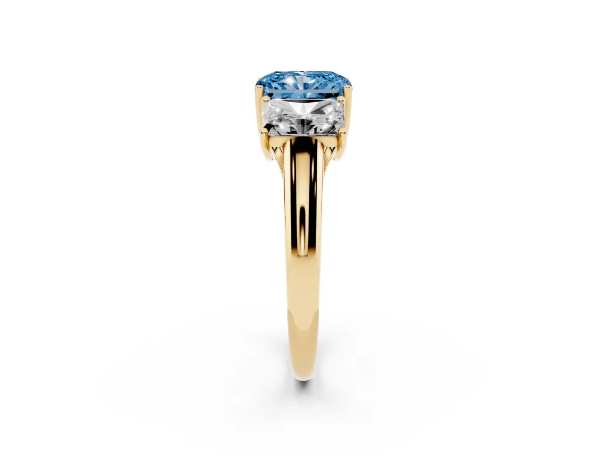Fancy Blue Three-Stone Radiant Cut Diamond Engagement Ring with Prong Setting Yellow gold
