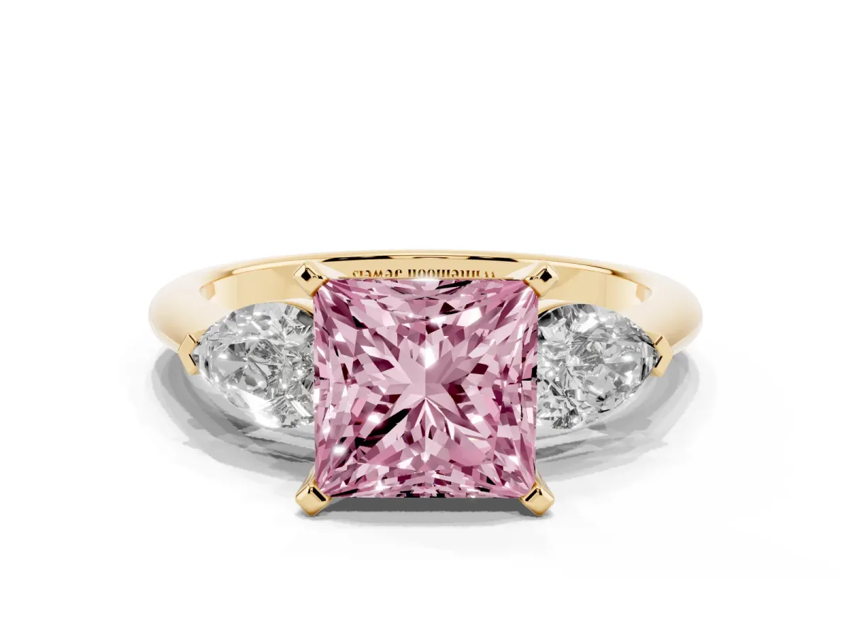 Fancy Pink Three-Stone Princess Cut Diamond Ring with Pear Side Stones and Four-Prong Setting Yellow gold
