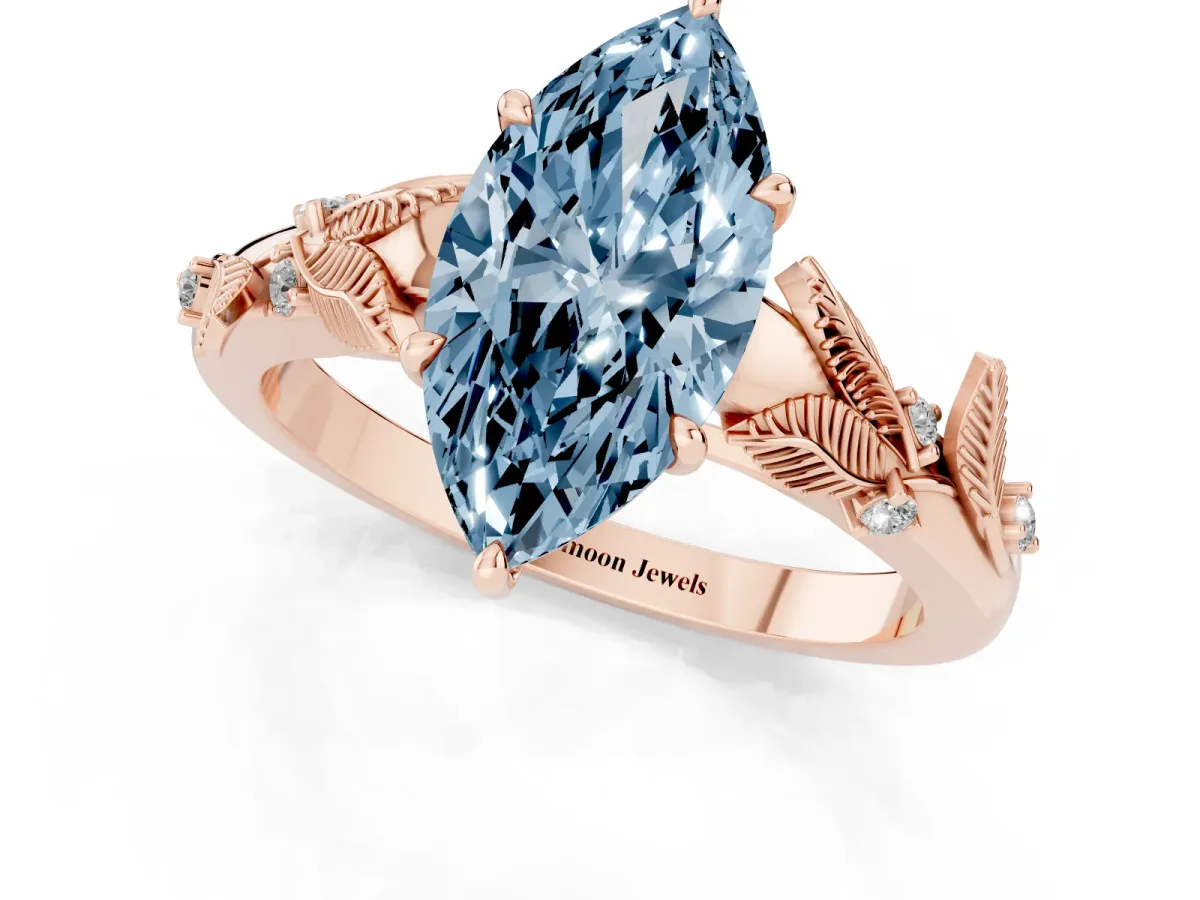 Fancy Blue Marquise Cut Diamond Solitaire Ring with Leaf Motif Band and Four-Prong Setting Rose gold