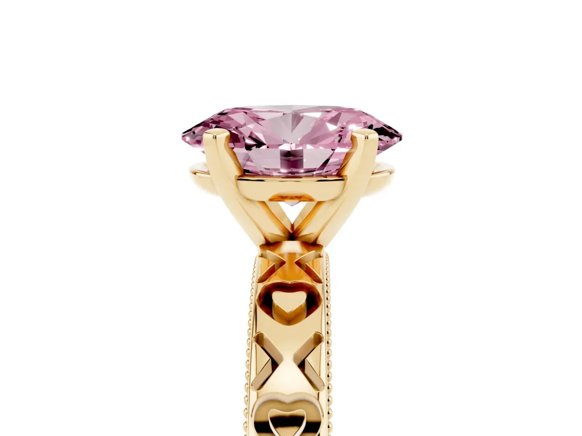 Fancy Pink Oval Cut Solitaire Diamond Engagement Ring with XO Engraved Band and Four-Prong Setting Yellow gold