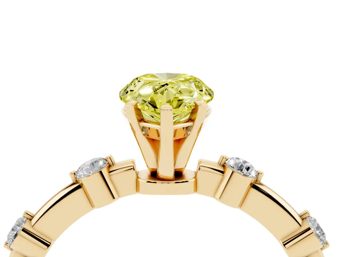 Fancy Yellow Pear Cut Solitaire Diamond Ring with Bezel Set Side Stones and Prong Setting Yellow gold