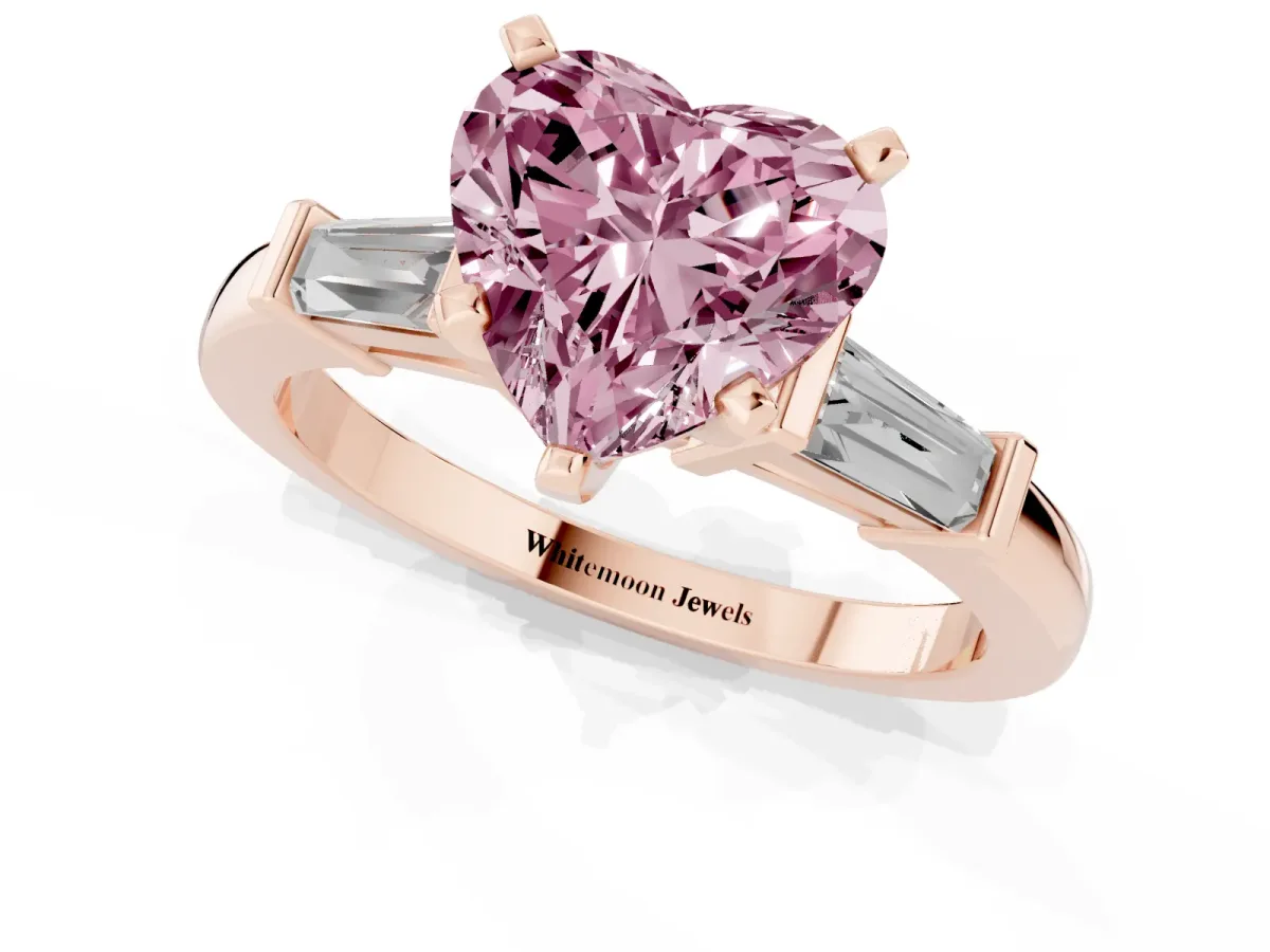 Fancy Pink Heart Cut Cut Diamond Solitaire Ring with Tapered Baguette Accents and Four-Prong Setting Rose gold