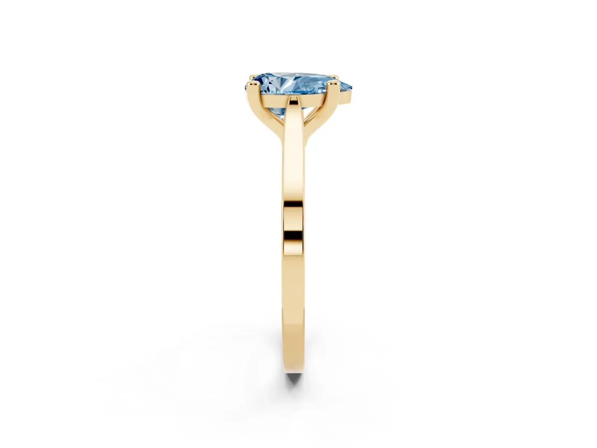 Fancy Blue Pear Cut Solitaire Diamond Ring with Four-Prong Setting and Tapered Band Yellow gold