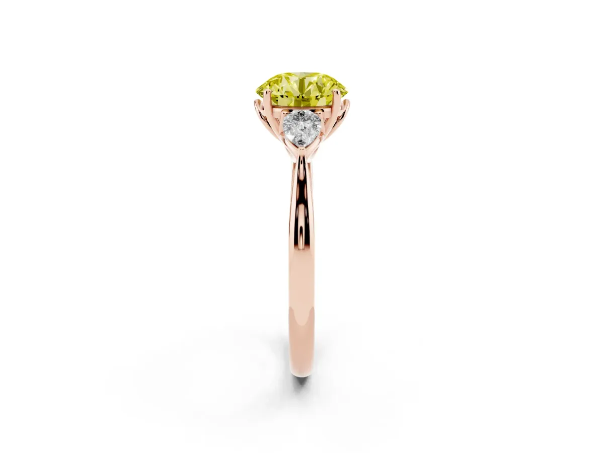 Fancy Yellow Three-Stone Round Cut Diamond Ring with Pear Side Stones in Four-Prong Setting Rose gold