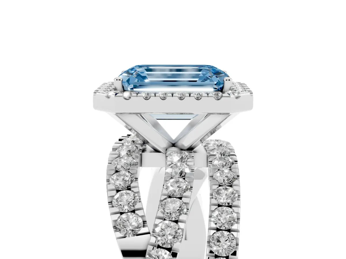 Fancy Blue Emerald Cut Diamond Halo Ring with Round Split Shank and Prong Setting Platinum